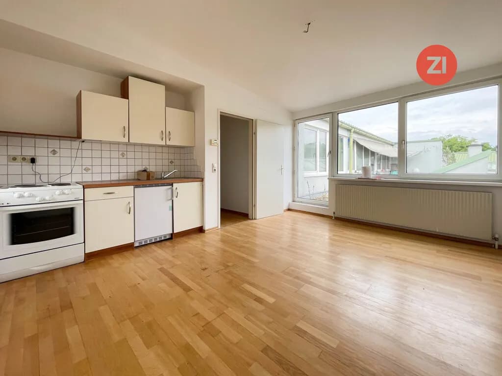 Günstig kaufen, selbst sanieren: 2-Zi.-Wohnung. mit Dachterrasse im Zentrum St. Georgen/Gusen - Bild 1