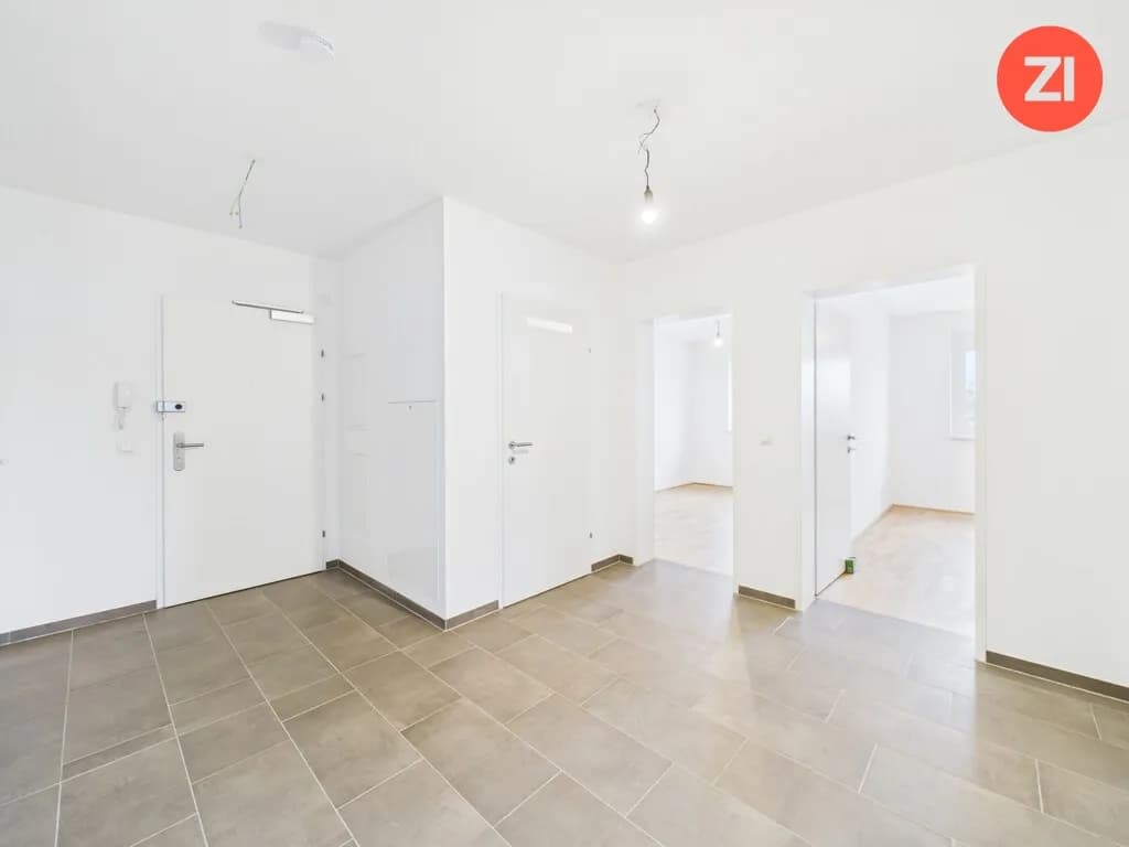 Zuhause am Inn – Geförderte 4 ZI-Wohnungen mit Balkon & Tiefgaragenparkplatz - Bild 1