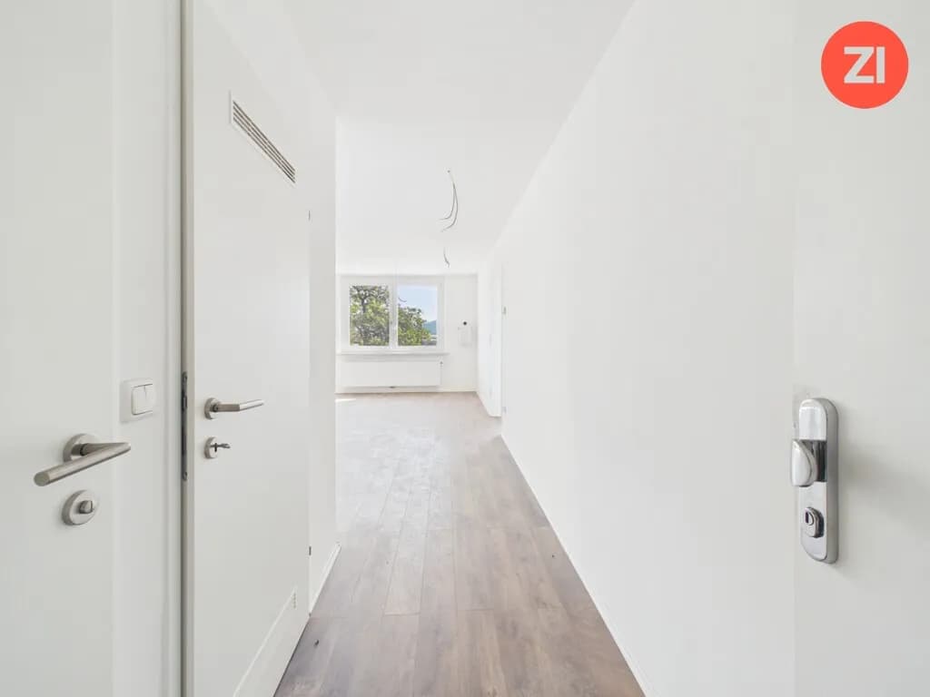 Generalsanierte Wohnung in Bahnhofsnähe mit Balkon und Außenstellplätzen - Bild 1